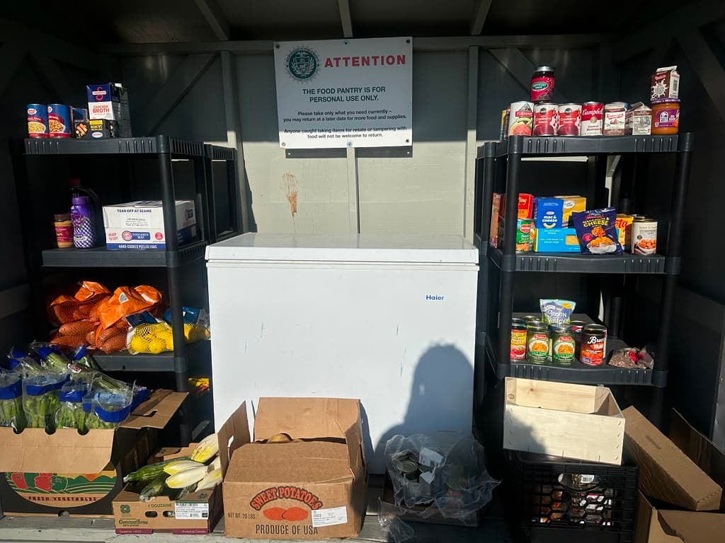 Volunteers organizing supplies at the community pantry
