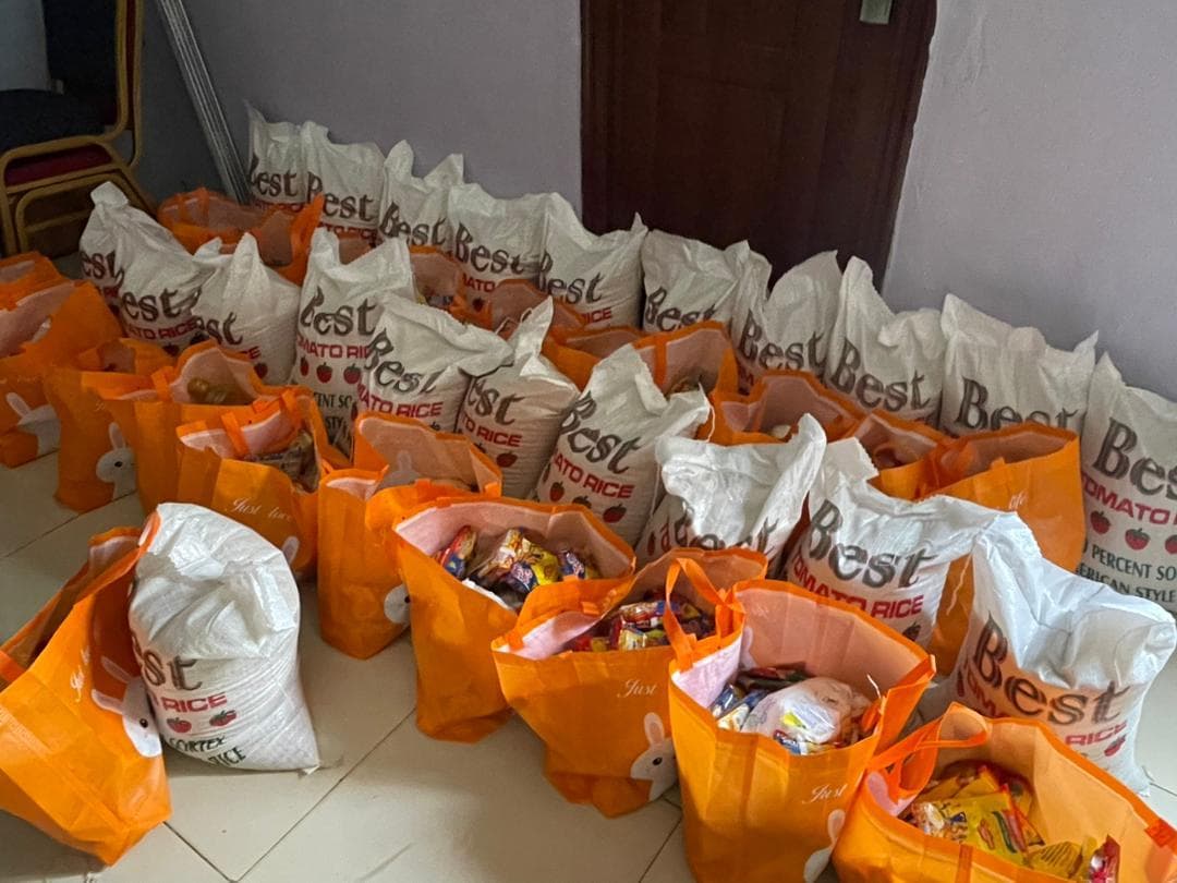 Community member receiving food donations through the We Care program